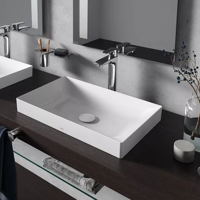 

TOTO TR Lavatory Раковина 600x380x137(70) мм, полувстр, без отв. под смесит, с переливом, CeFiONtect, LinearCeram цвет: белый (без арматуры слива)