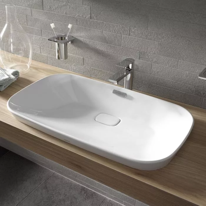 

TOTO NEOREST Раковина 596x397x173(50) мм, полувстраив, без отв. под смеситель, с переливом,с декорат керамической накладкой, CeFiONtect цвет:бел