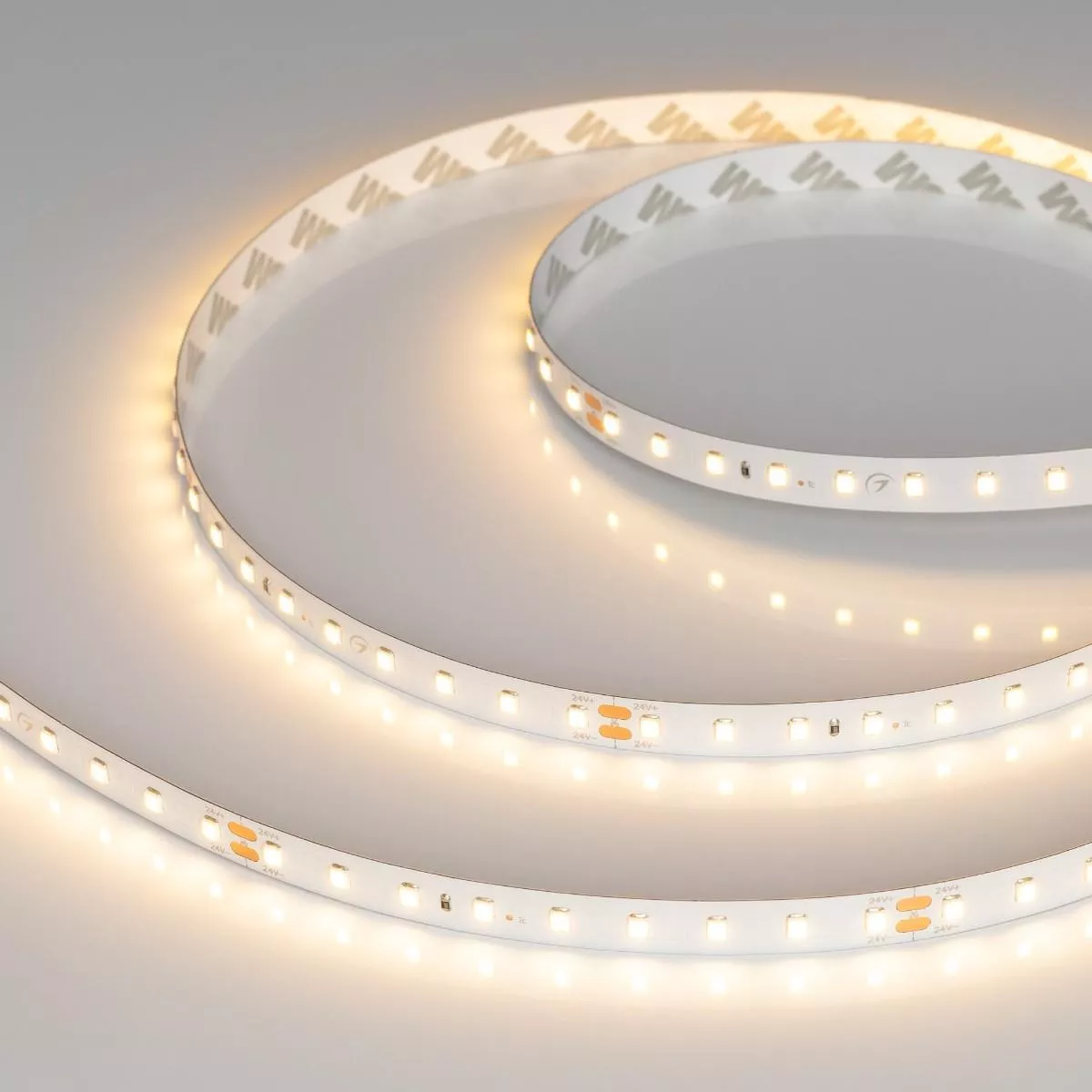 

Светодиодная лента Arlight 4,8W/m 90LED/m 2835SMD теплый белый 5M UL-A160-8mm 24V Warm2700 038777